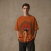 Retro Cassette Head Graphic Oversized T-Shirt – Vintage Music Inspired Orange Cotton Tee